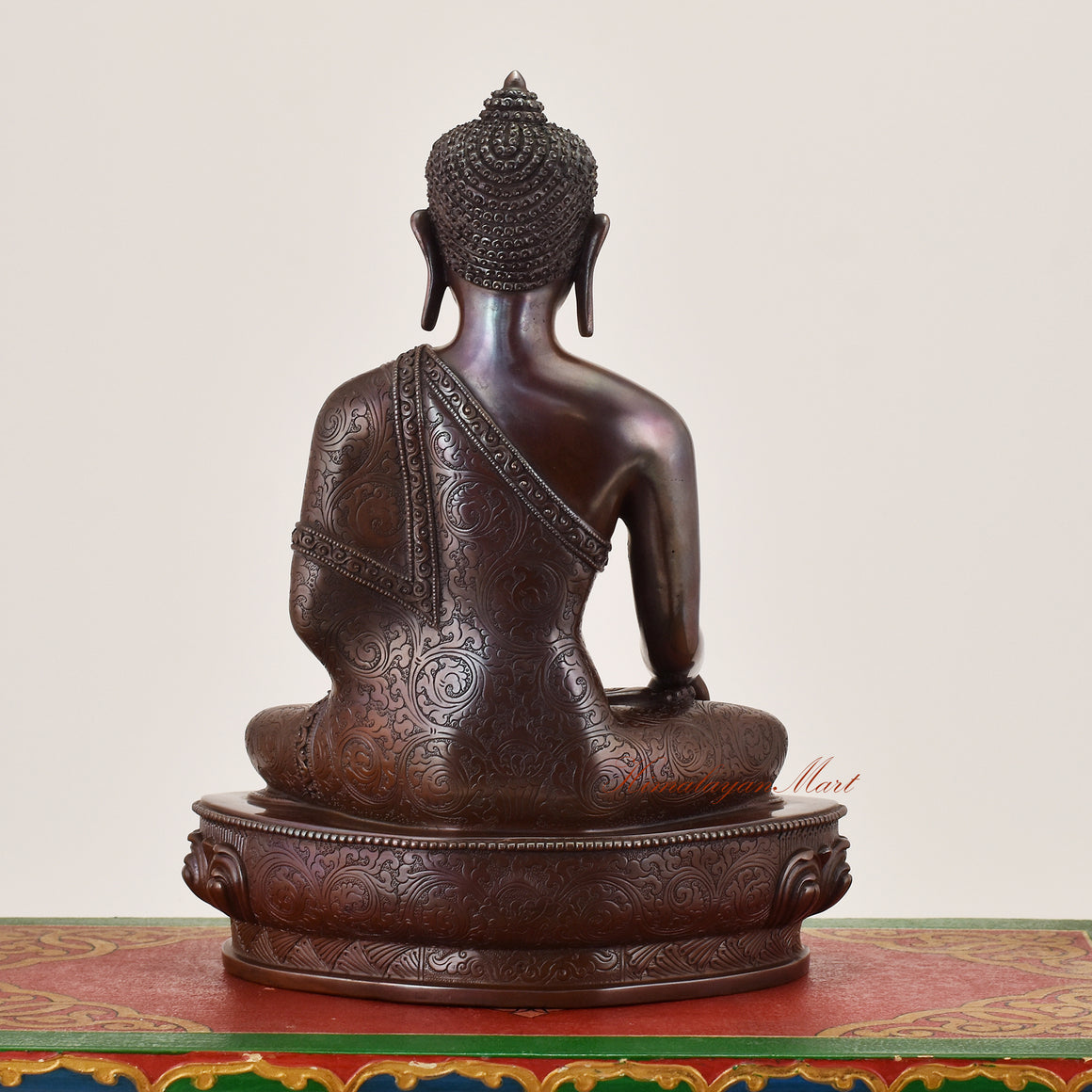 Back view of Shakyamuni Buddha Idol sacred statue displaying intricate sculptural detailing and traditional design