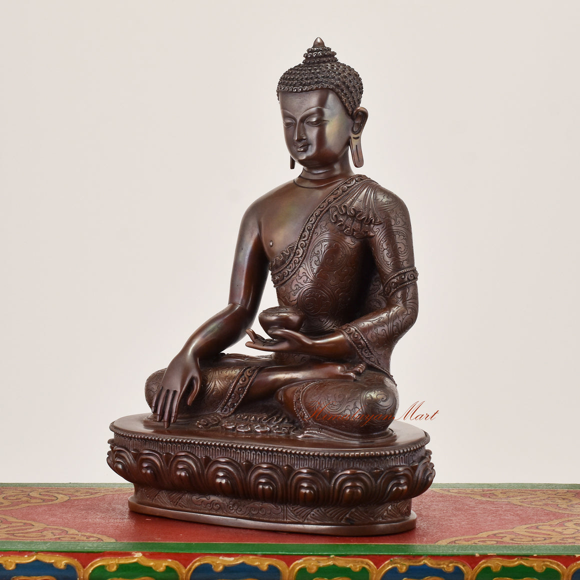 Left-side view of Shakyamuni Buddha Idol sacred statue showcasing detailed robes and symbolic meditative posture
