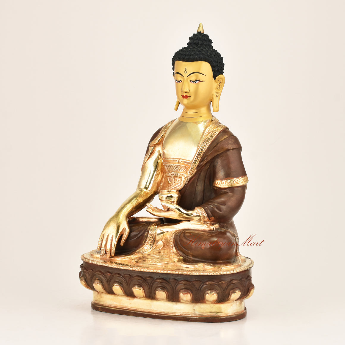 Left side view of a handcrafted Shakyamuni Buddha statue, gold-plated copper alloy, Newar artisan, Patan, Nepal