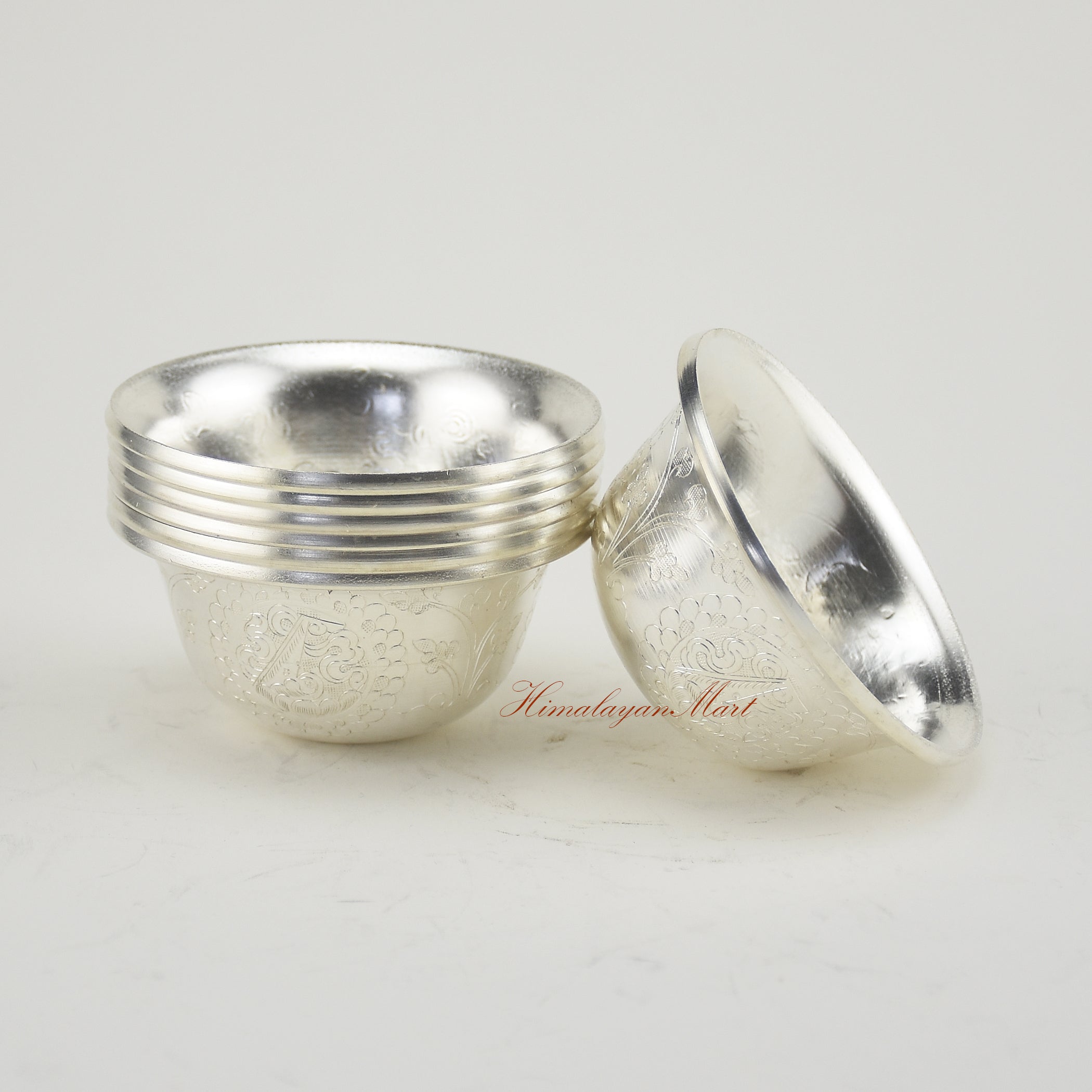 Inner surface of Silver-Plated Water Offering Bowls revealing smooth ritual design