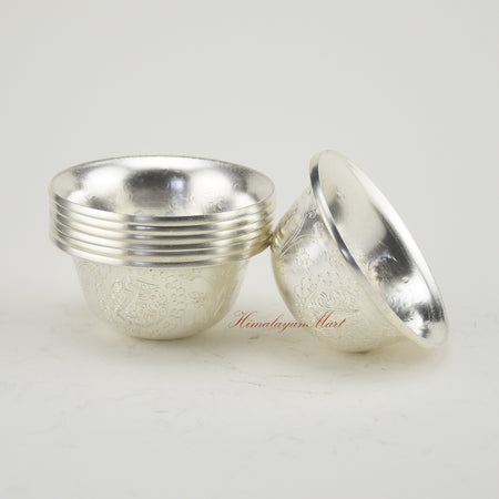 Inner surface of Silver-Plated Water Offering Bowls revealing smooth ritual design
