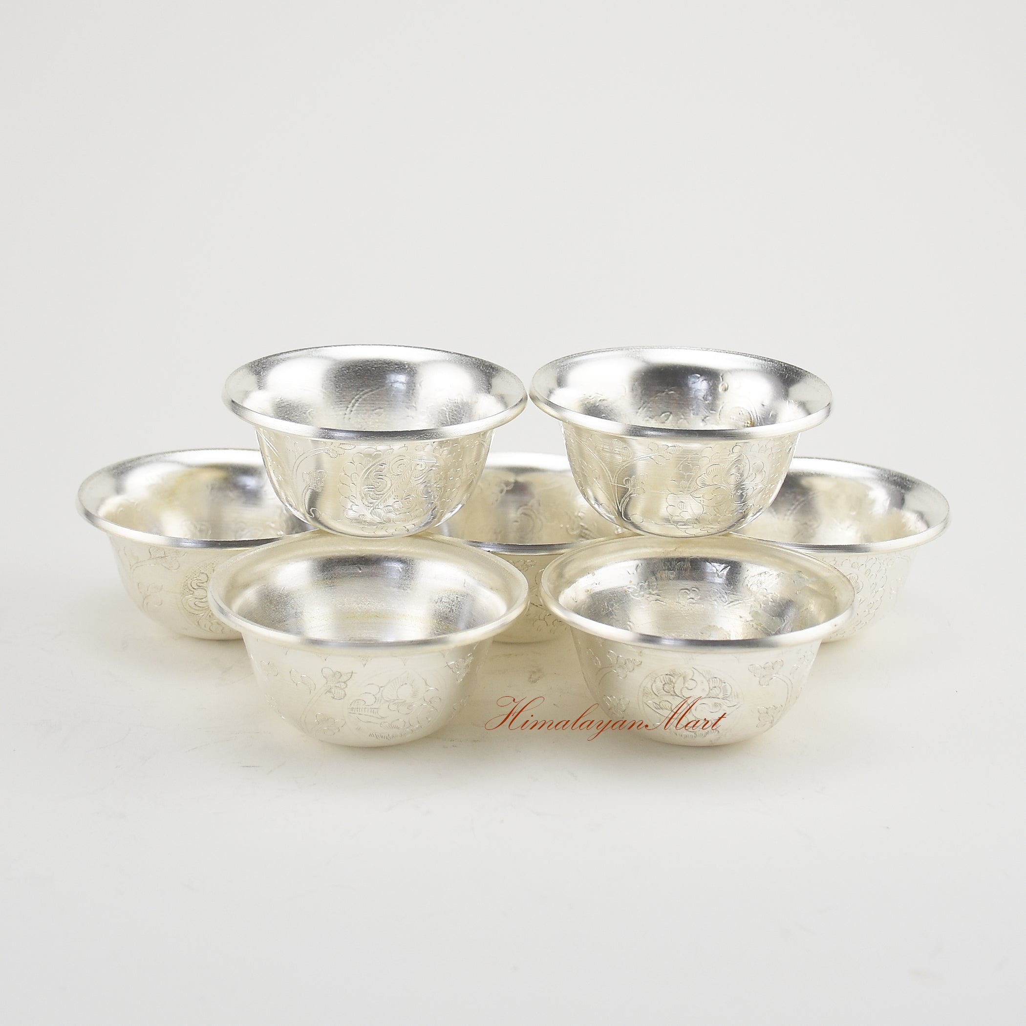 Silver-Plated Water Offering Bowls arranged on a spiritual altar for daily Buddhist practice
