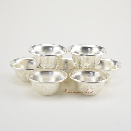 Silver-Plated Water Offering Bowls arranged on a spiritual altar for daily Buddhist practice
