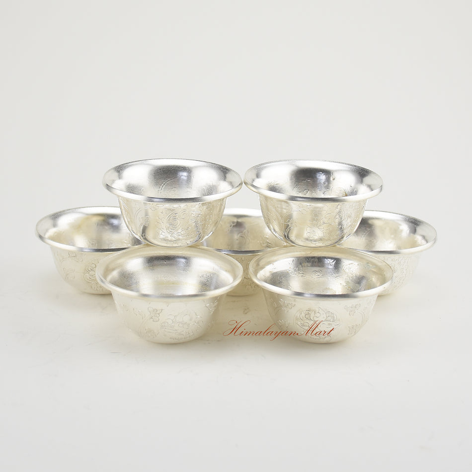 Silver-Plated Water Offering Bowls arranged on a spiritual altar for daily Buddhist practice