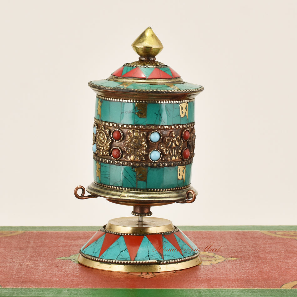 Side view of Small Tabletop Prayer Wheel – handcrafted Tibetan Buddhist ritual tool with decorative details.