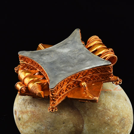 Bottom view of Spiritual Prayer Box Jewelry showing smooth finish and finely detailed brass construction.