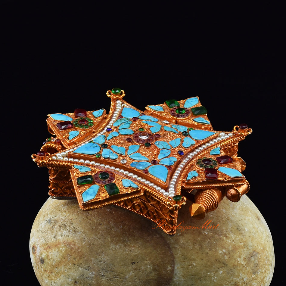Side view of Tibetan Spiritual Prayer Box Jewelry showing intricate brass craftsmanship and semi-precious stones.