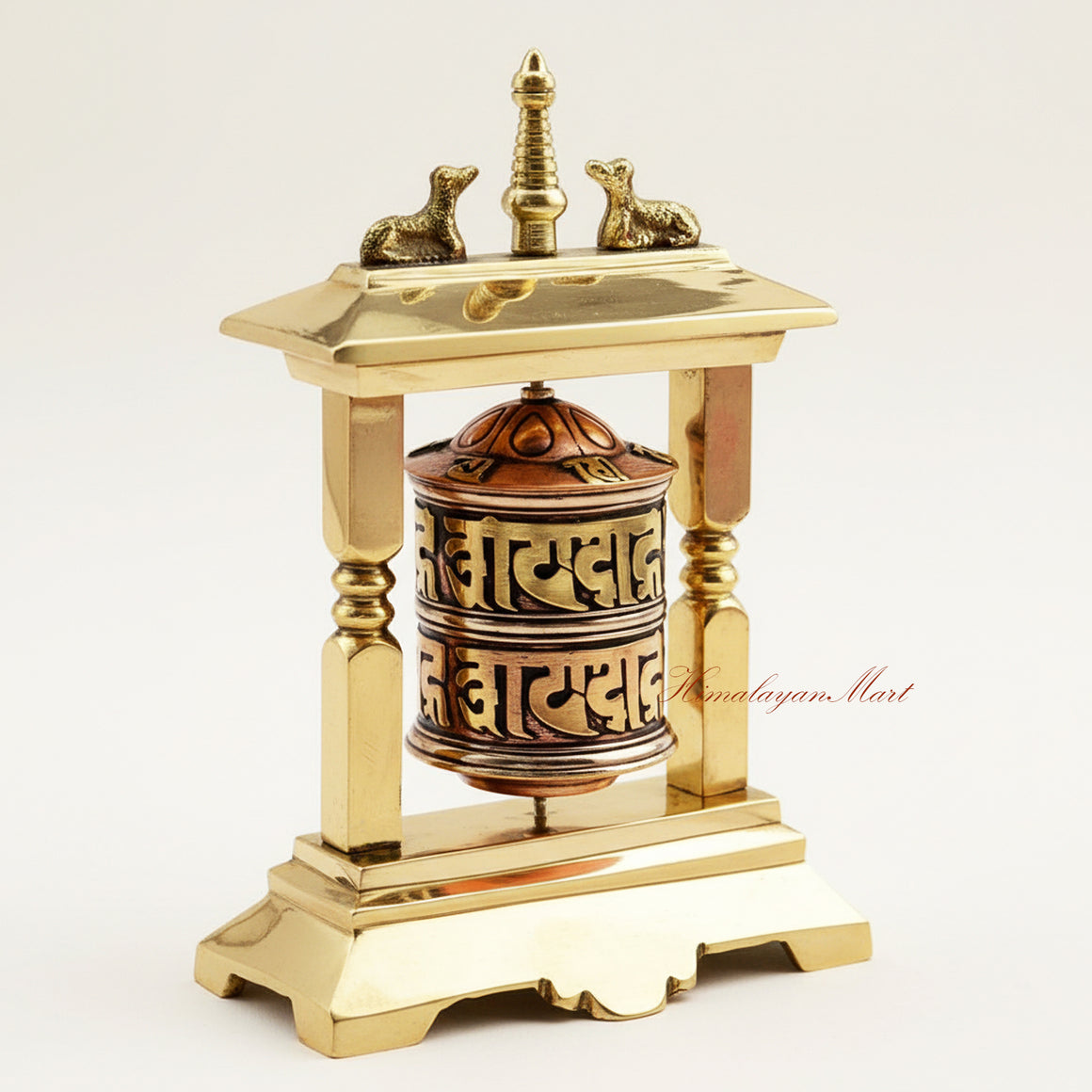 Side view of a handcrafted Table Top Prayer Wheel showing engraved brass mantra cylinder and detailed stupa, perfect for Buddhist meditation and home altar.