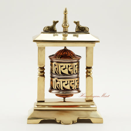 Handcrafted Table Top Prayer Wheel in brass and white metal, featuring a central stupa and deer, ideal for meditation, ritual, and spiritual decor.