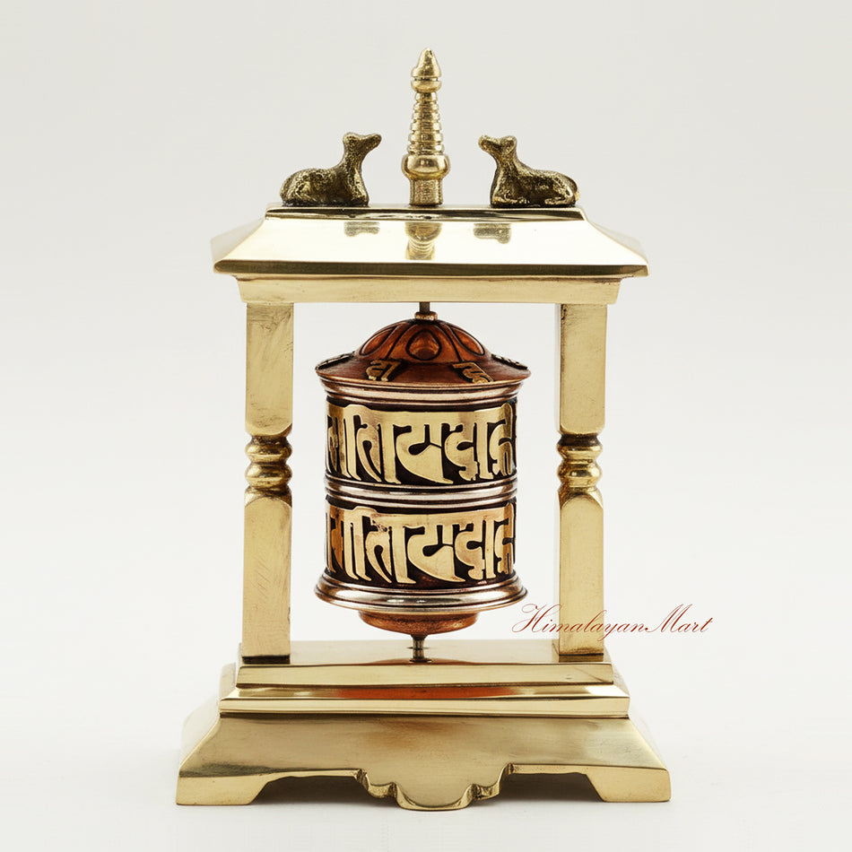 Handcrafted Table Top Prayer Wheel in brass and white metal, featuring a central stupa and deer, ideal for meditation, ritual, and spiritual decor.