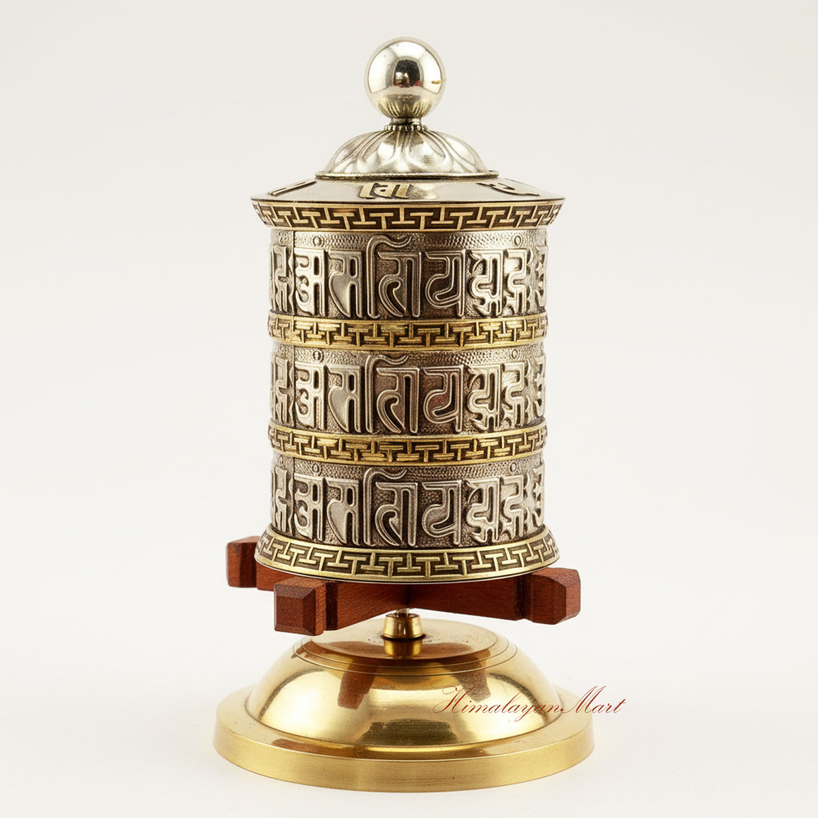 Tabletop Mani Prayer Wheel – handcrafted Tibetan Buddhist wheel for mantra recitation, made of copper, brass, white metal with wooden base.