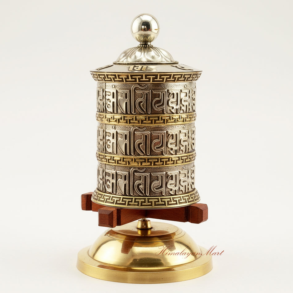 Tabletop Mani Prayer Wheel – handcrafted Tibetan Buddhist wheel for mantra recitation, made of copper, brass, white metal with wooden base.