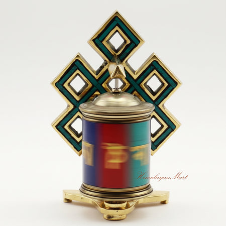 Tabletop Ritual Prayer Wheel in motion, demonstrating the traditional spinning practice for Buddhist meditation and prayer.