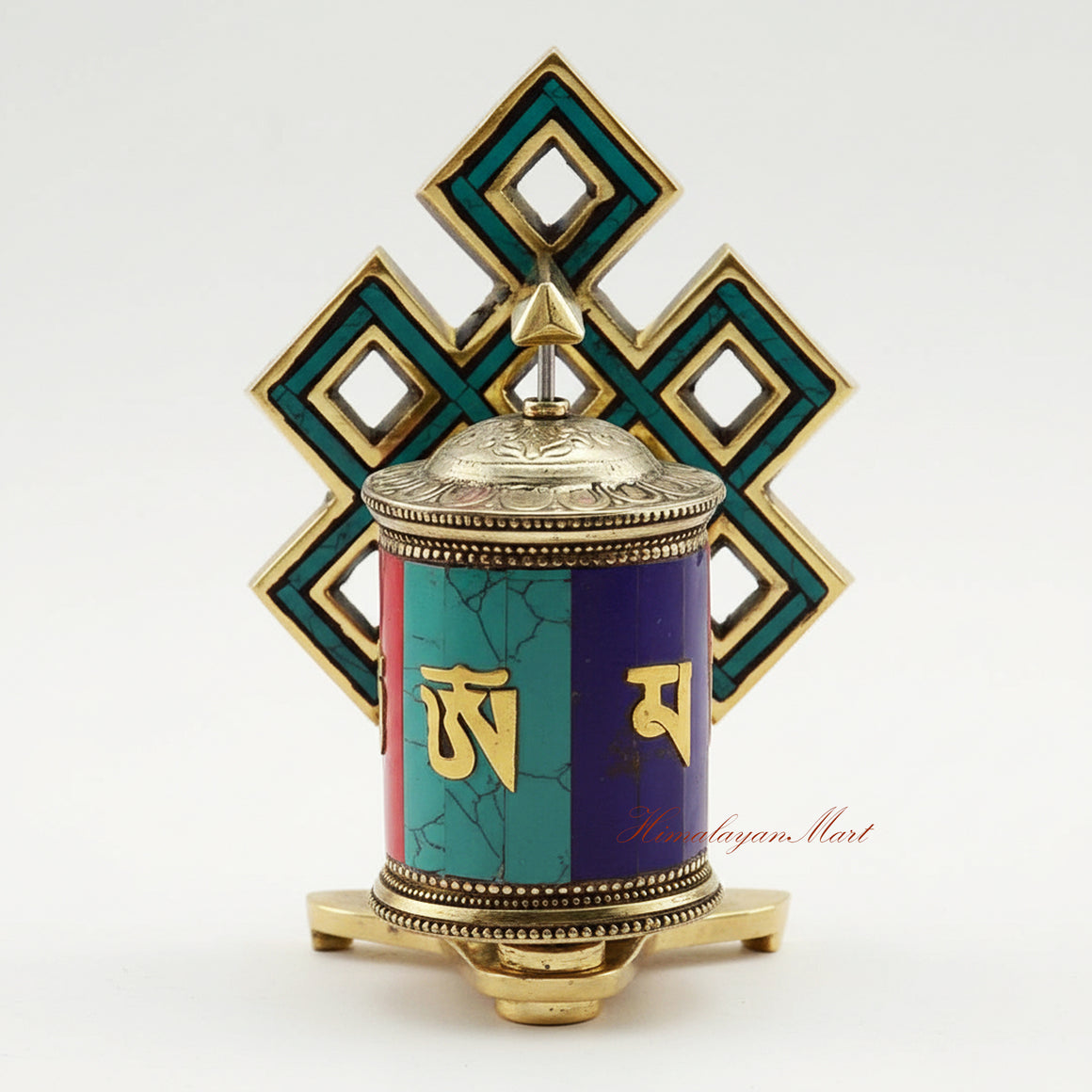 Tabletop Ritual Prayer Wheel handcrafted from brass and white metal with semi-precious stones on a meditation altar.
