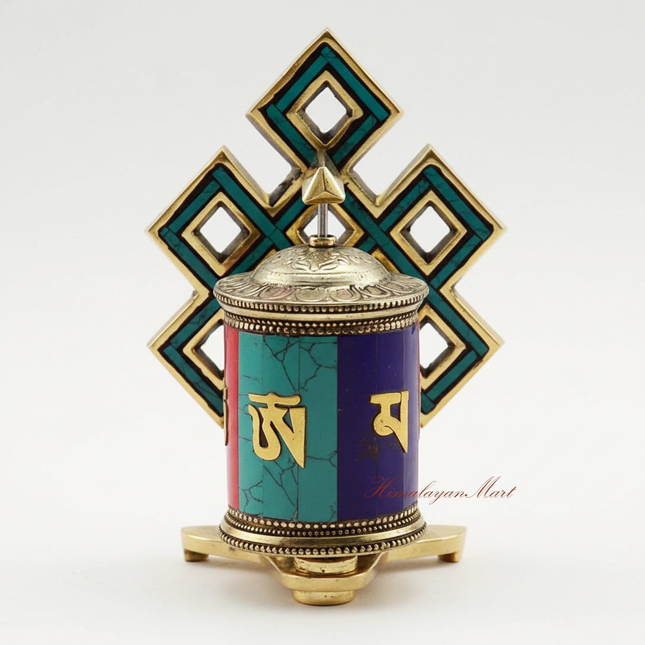 Tabletop Ritual Prayer Wheel handcrafted from brass and white metal with semi-precious stones on a meditation altar.
