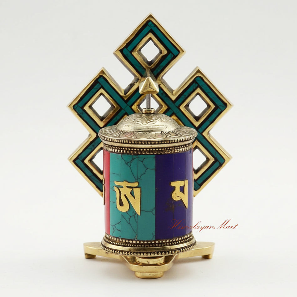 Tabletop Ritual Prayer Wheel handcrafted from brass and white metal with semi-precious stones on a meditation altar.
