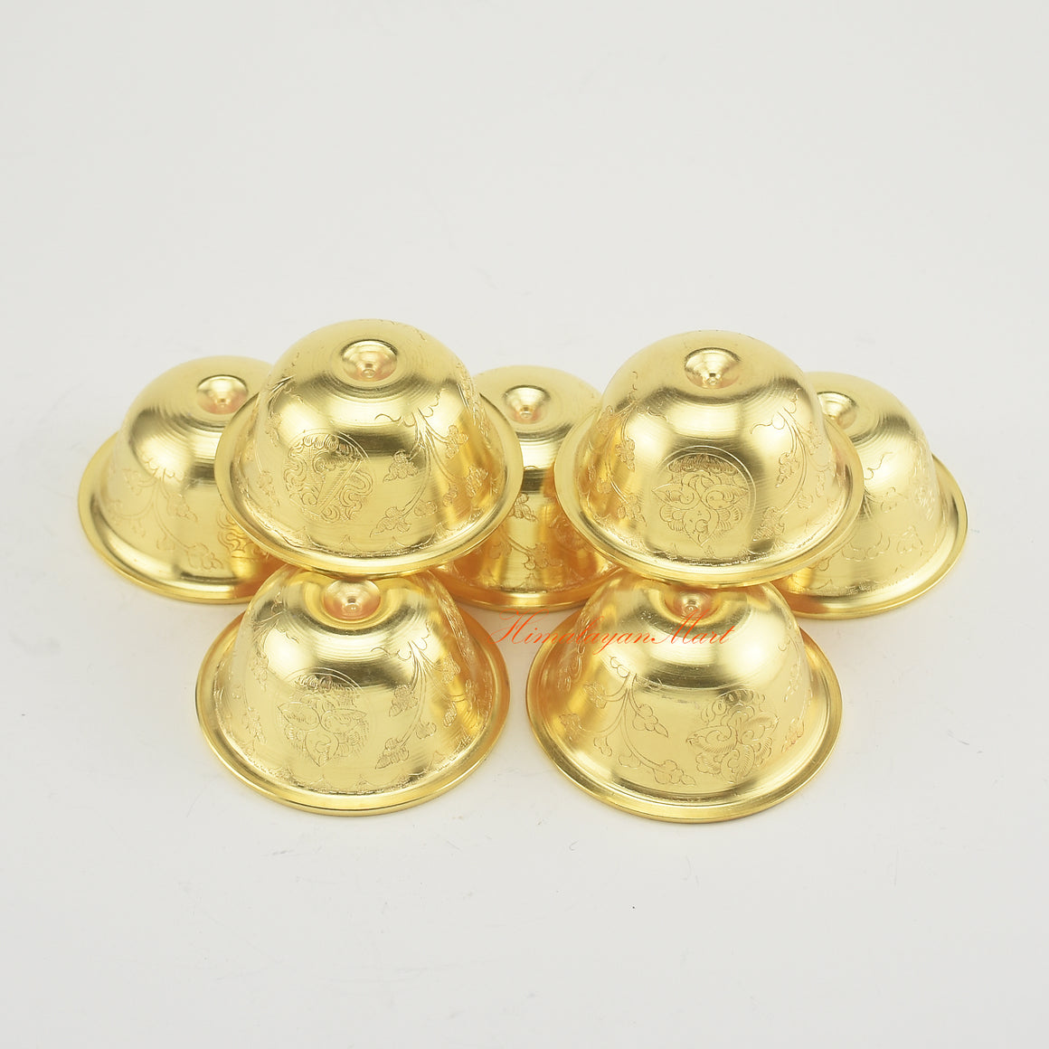 Upper perspective of Tibetan Altar Offering Bowls revealing detailed sacred motifs and traditional design patterns.