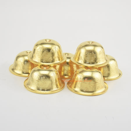 Top-down view of Tibetan Altar Offering Bowls showing intricate hand-carved Buddhist symbols and gold-plated finish.