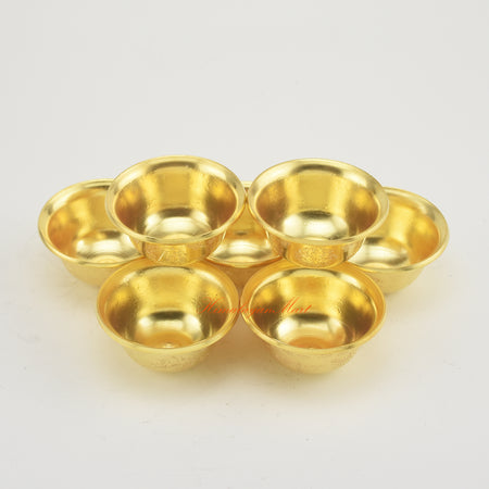 Angled upper side view of Tibetan Altar Offering Bowls highlighting craftsmanship and radiant gold plating.