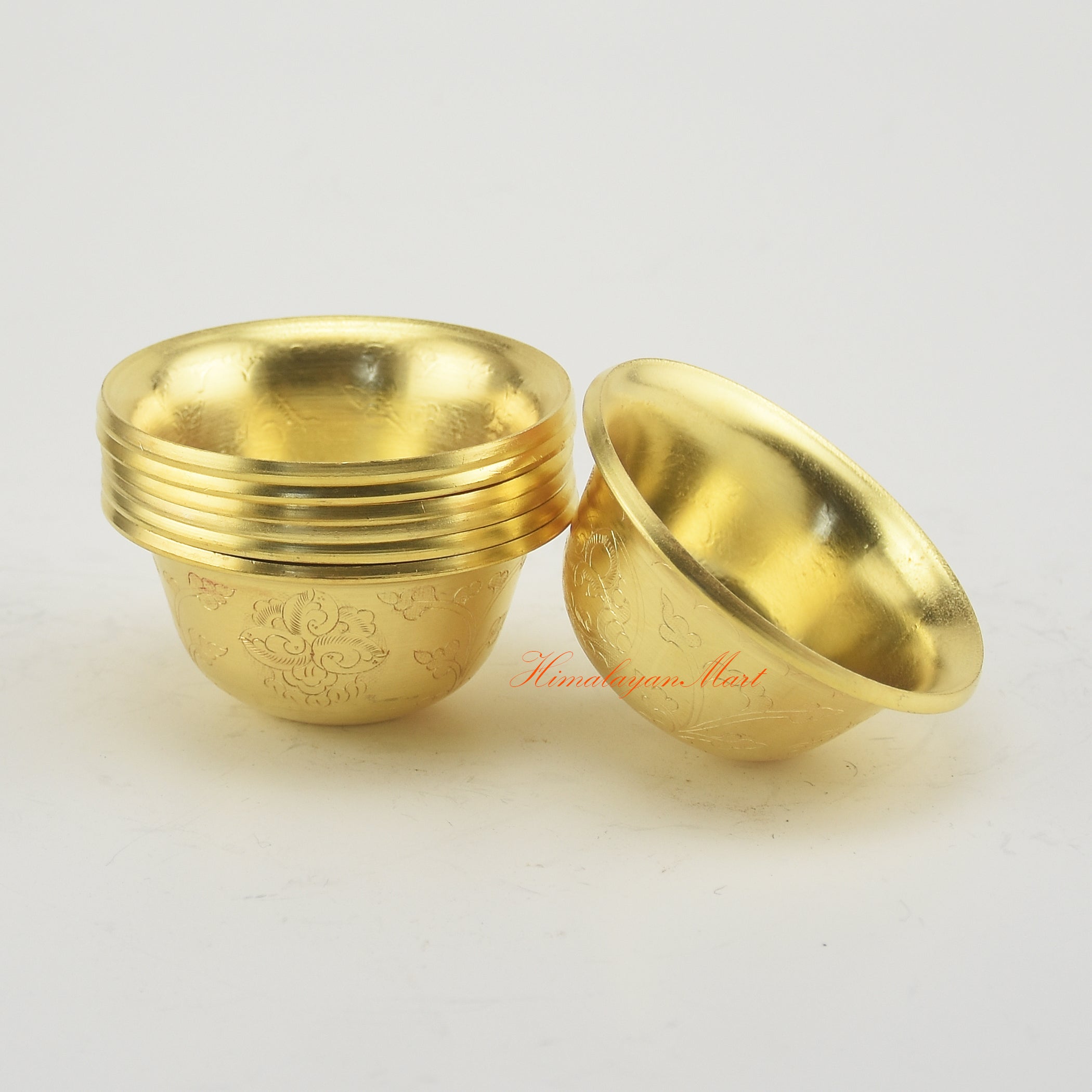 Side view of Tibetan Altar Offering Bowls showing elegant proportions and handmade artisanal details.