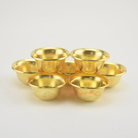 Complete set of Tibetan Altar Offering Bowls displayed on a Buddhist altar for meditation and rituals.