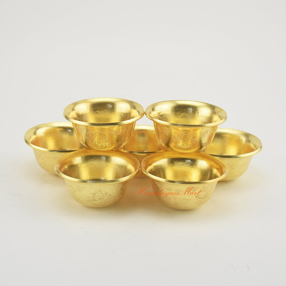Complete set of Tibetan Altar Offering Bowls displayed on a Buddhist altar for meditation and rituals.