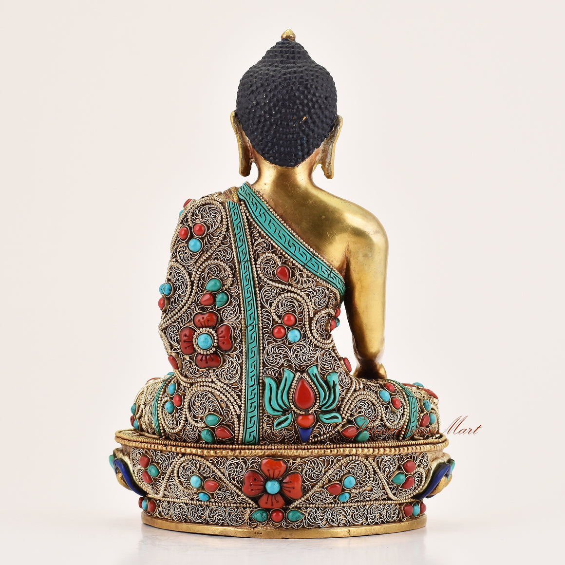 Back view of handcrafted Tibetan altar statue of Shakyamuni Buddha, meditation sculpture for altar and spiritual spaces