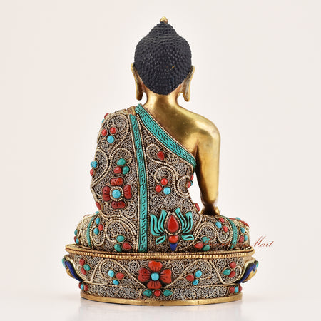 Back view of handcrafted Tibetan altar statue of Shakyamuni Buddha, meditation sculpture for altar and spiritual spaces