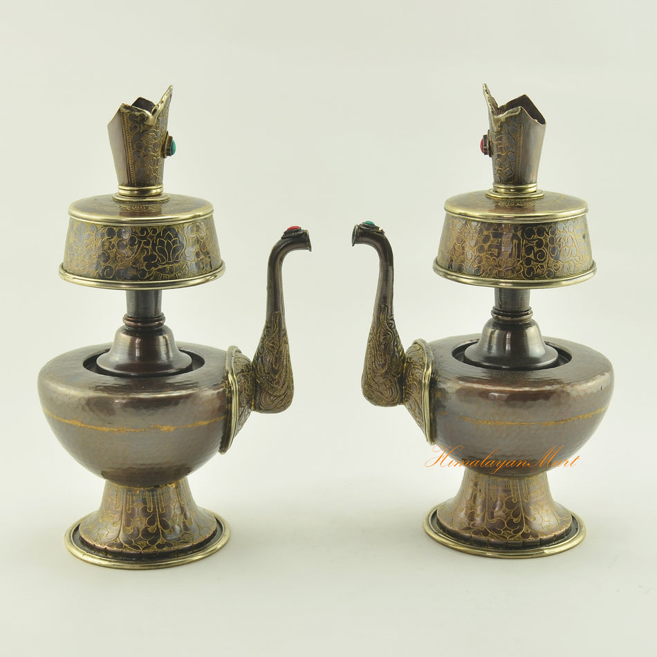Tibetan Bhumba Set displayed together, sacred Buddhist water offering vessels in oxidized copper with brass rings and stone inlay