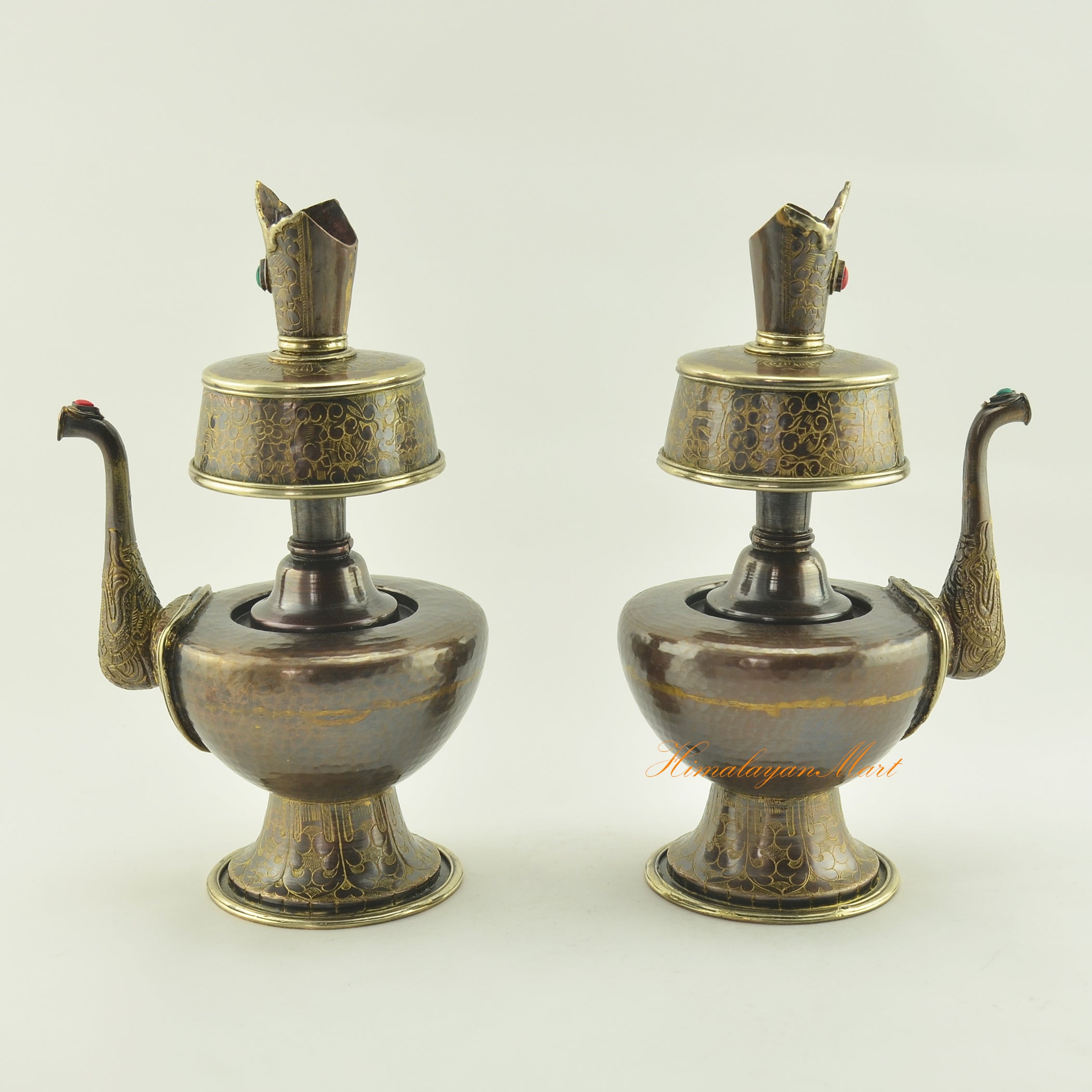 Left and right view of Tibetan Bhumba Set showing hand-carved oxidized copper ritual vessels with brass accents