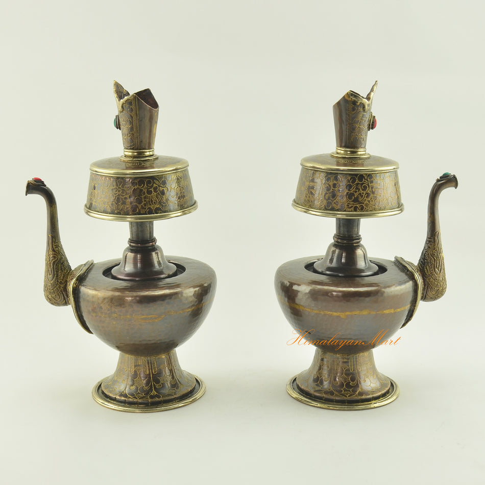 Left and right view of Tibetan Bhumba Set showing hand-carved oxidized copper ritual vessels with brass accents