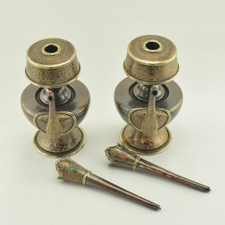 Detail view of Tibetan Bhumba Set components featuring fine hand carving and coral turquoise stone inlay