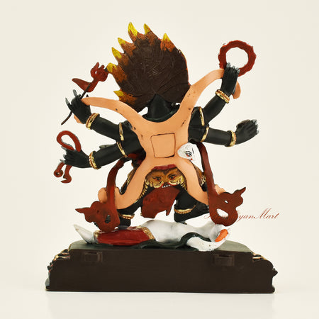 Back view of Tibetan Black Mahakala statue without frame, showing copper alloy casting and gold gilding detail