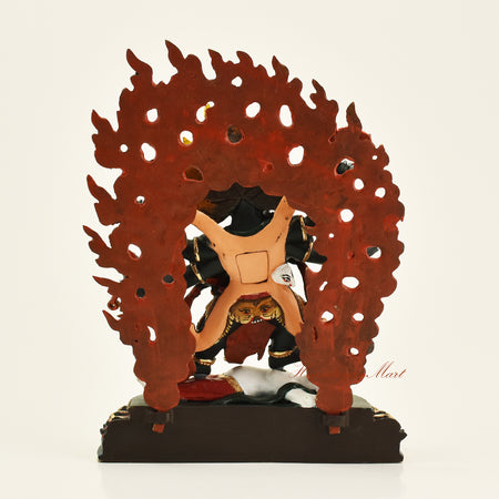 Back view of Tibetan Black Mahakala statue with wooden frame, handmade in Patan, Nepal