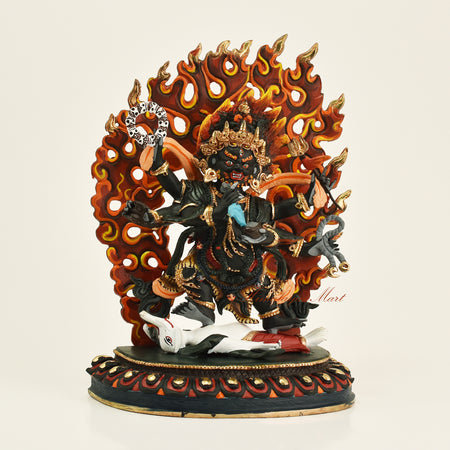 Right side view of Tibetan Black Mahakala statue showing hand-painted detail and copper alloy finish