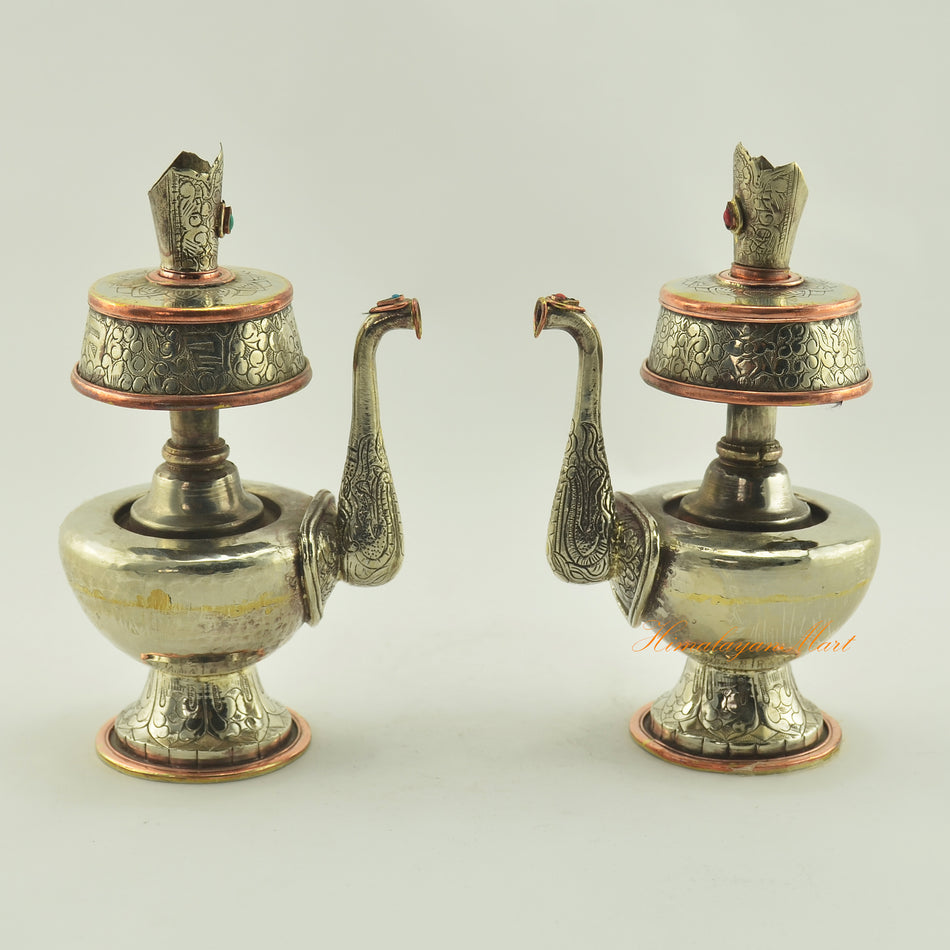 Tibetan Buddhist Ritual Bhumba set in white metal alloy with copper rings, shown side by side with hand carvings and coral turquoise inlay