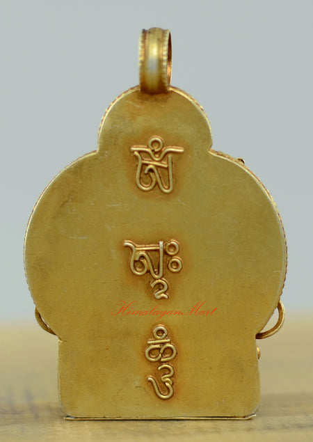 Back view of the Tibetan Green Tara Locket showing detailed hand-carved filigree and silver craftsmanship.