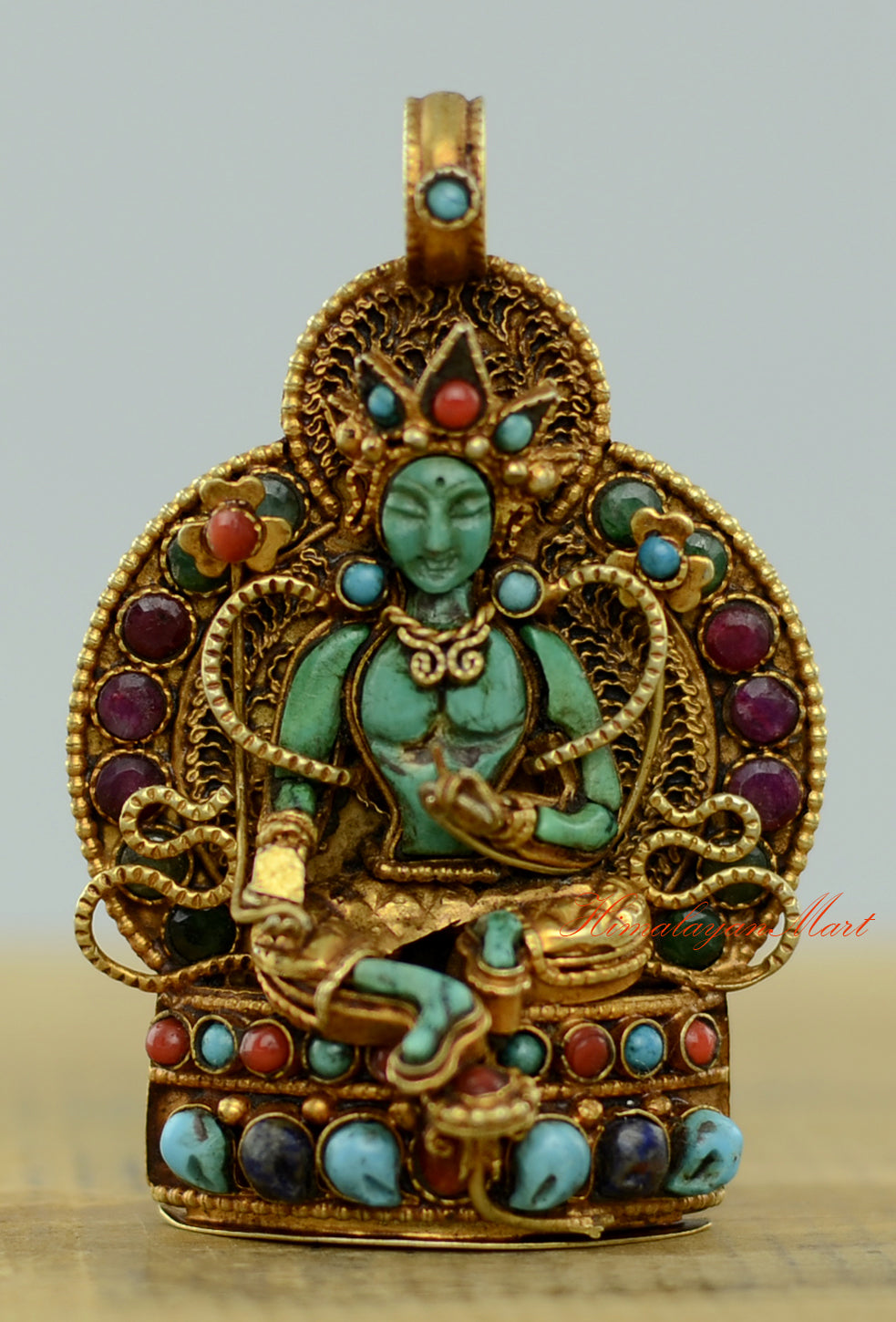 Tibetan Green Tara Locket with gold-plated silver, siko filigree, and turquoise, coral, emerald, and lapis gemstones.