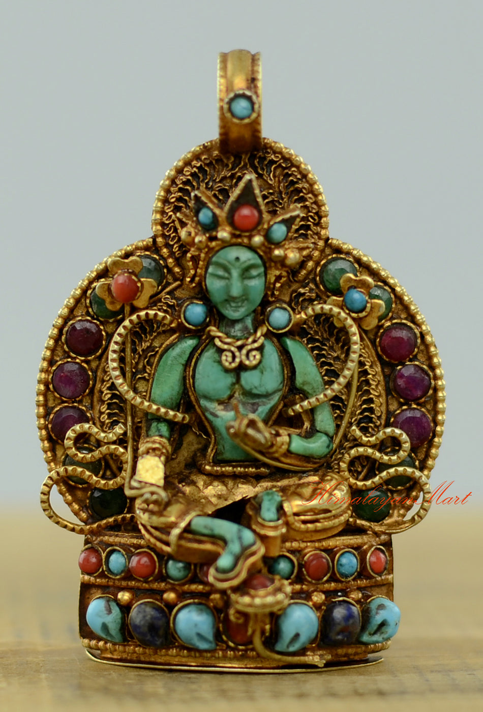 Tibetan Green Tara Locket with gold-plated silver, siko filigree, and turquoise, coral, emerald, and lapis gemstones.