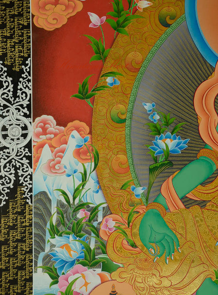 Close-up of Green Tara’s right hand in symbolic gesture from the traditional Buddhist Thangka.
