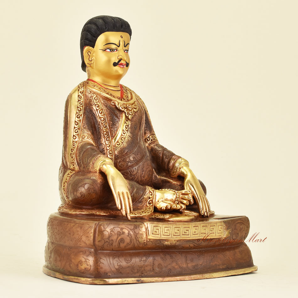 Right side view of Tibetan Guru Marpa Statue, revered Kagyu lineage translator and master