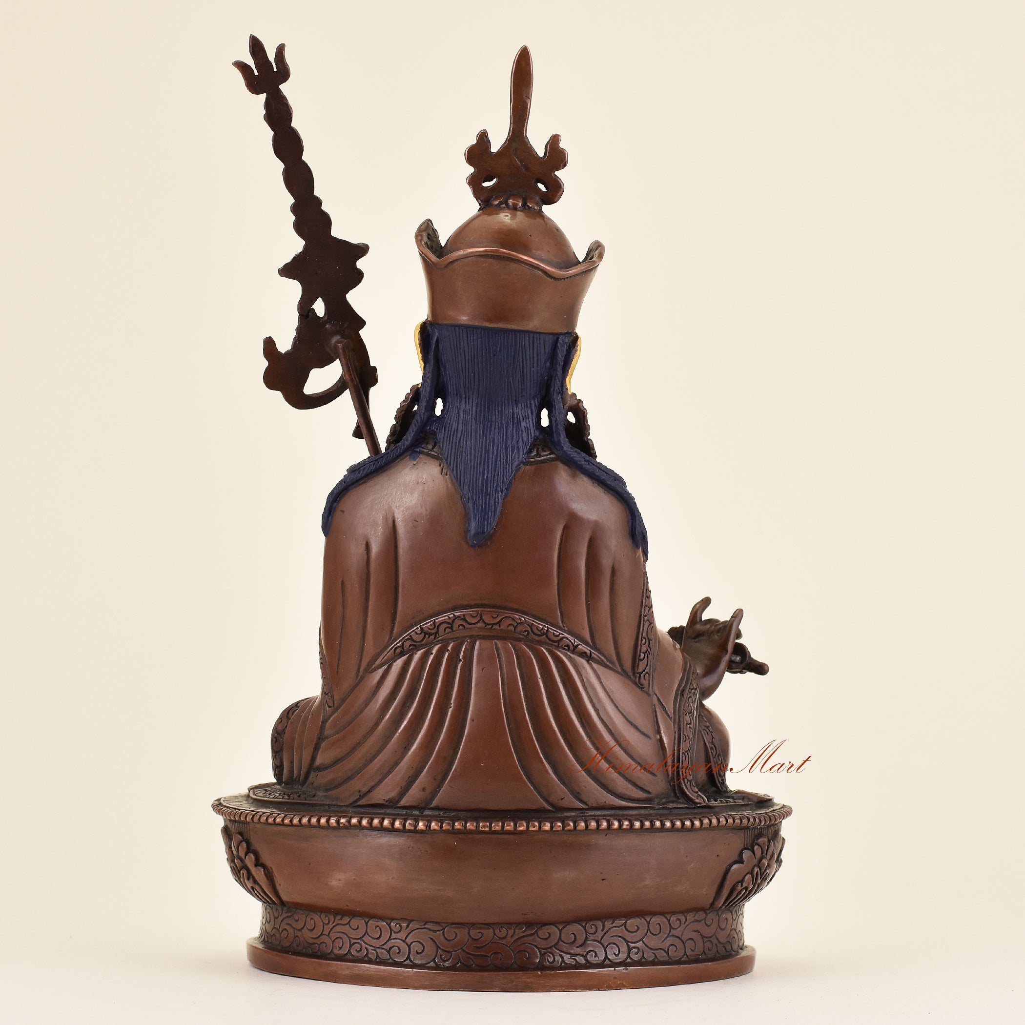 Back view of Tibetan Guru Padmasambhava statue showcasing traditional Himalayan lost wax art detailing