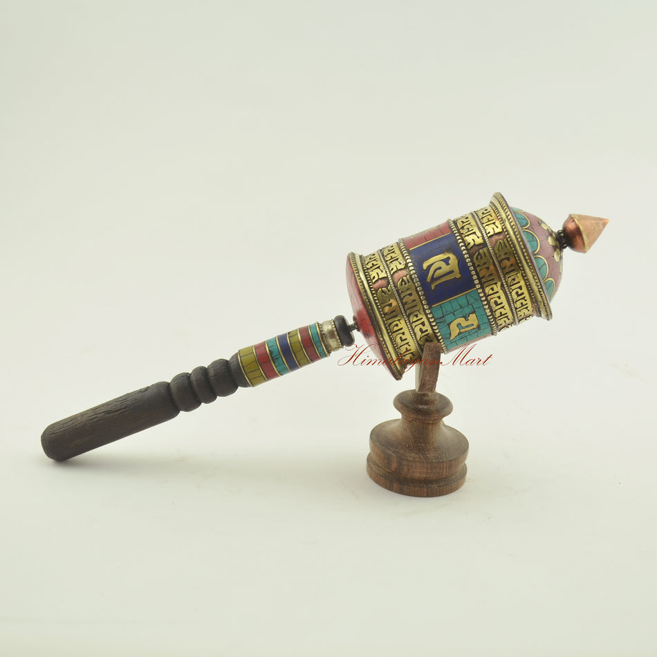 Tibetan Handheld Prayer Wheel shown from the right angle – used for Buddhist prayer and meditation practice