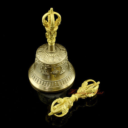 Side profile of Tibetan Buddhist Dorje and Ghanta set showing the five-pronged Vajra form and bell proportions