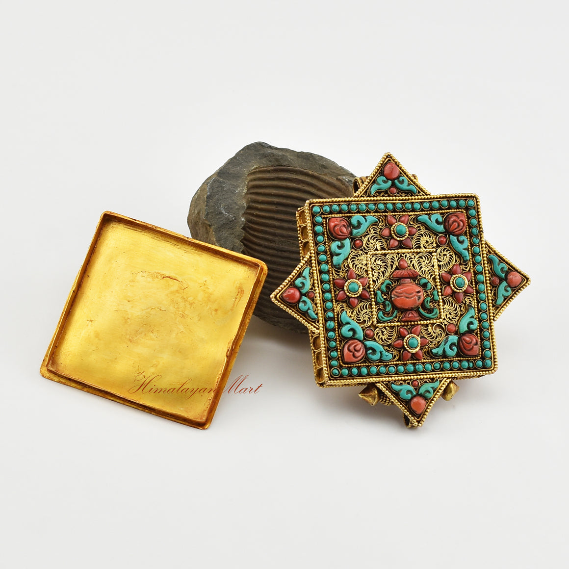 Opened Tibetan Religious Prayer Box Pendant revealing the inner compartment for mantras or sacred relics.