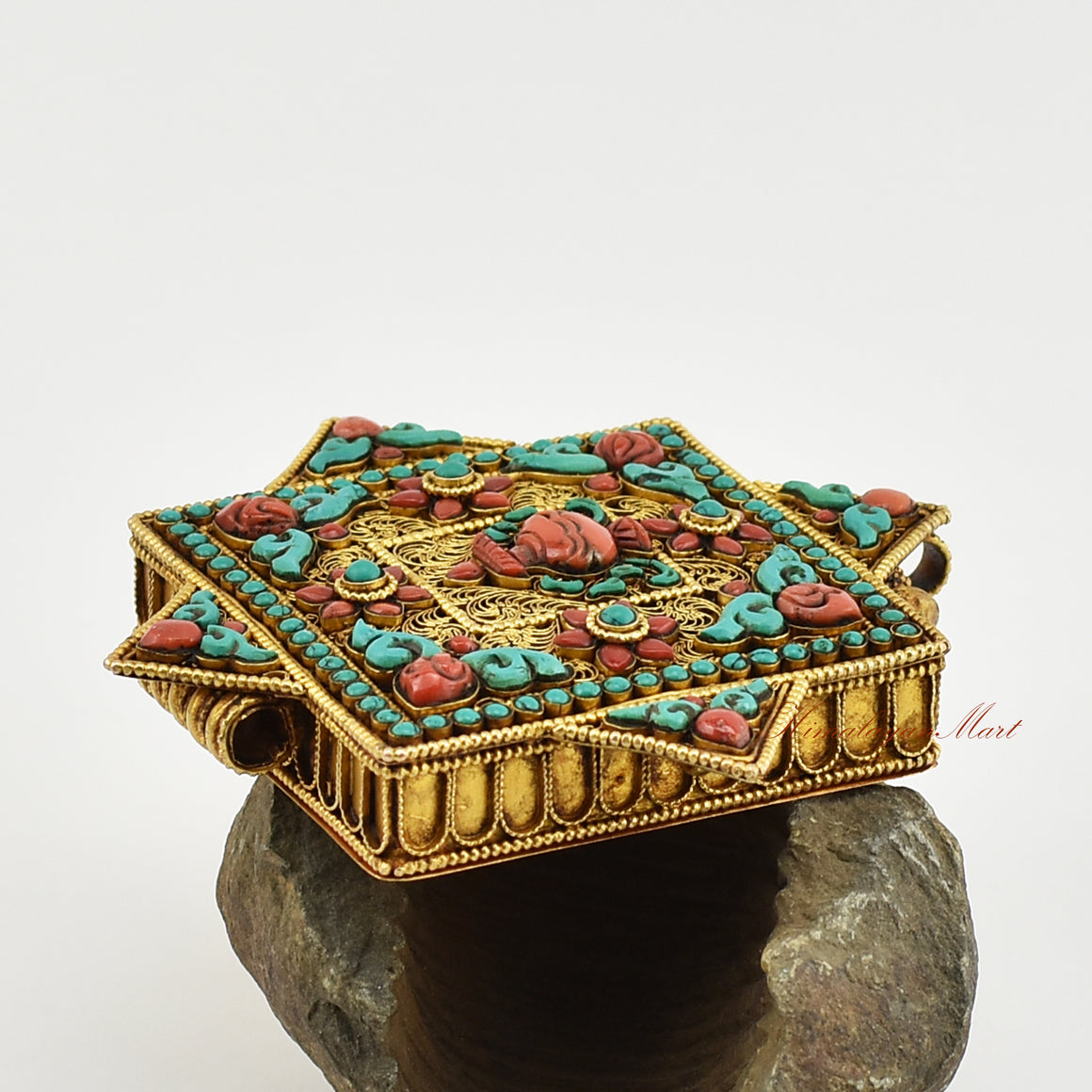 Right-side view of the Tibetan Religious Prayer Box Pendant showing exquisite floral motifs and gemstone embellishments.