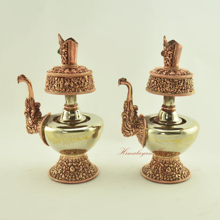 Left-side view of the Tibetan Ritual Bhumba Set with inlaid coral and turquoise, emphasizing traditional Nepalese metalwork.