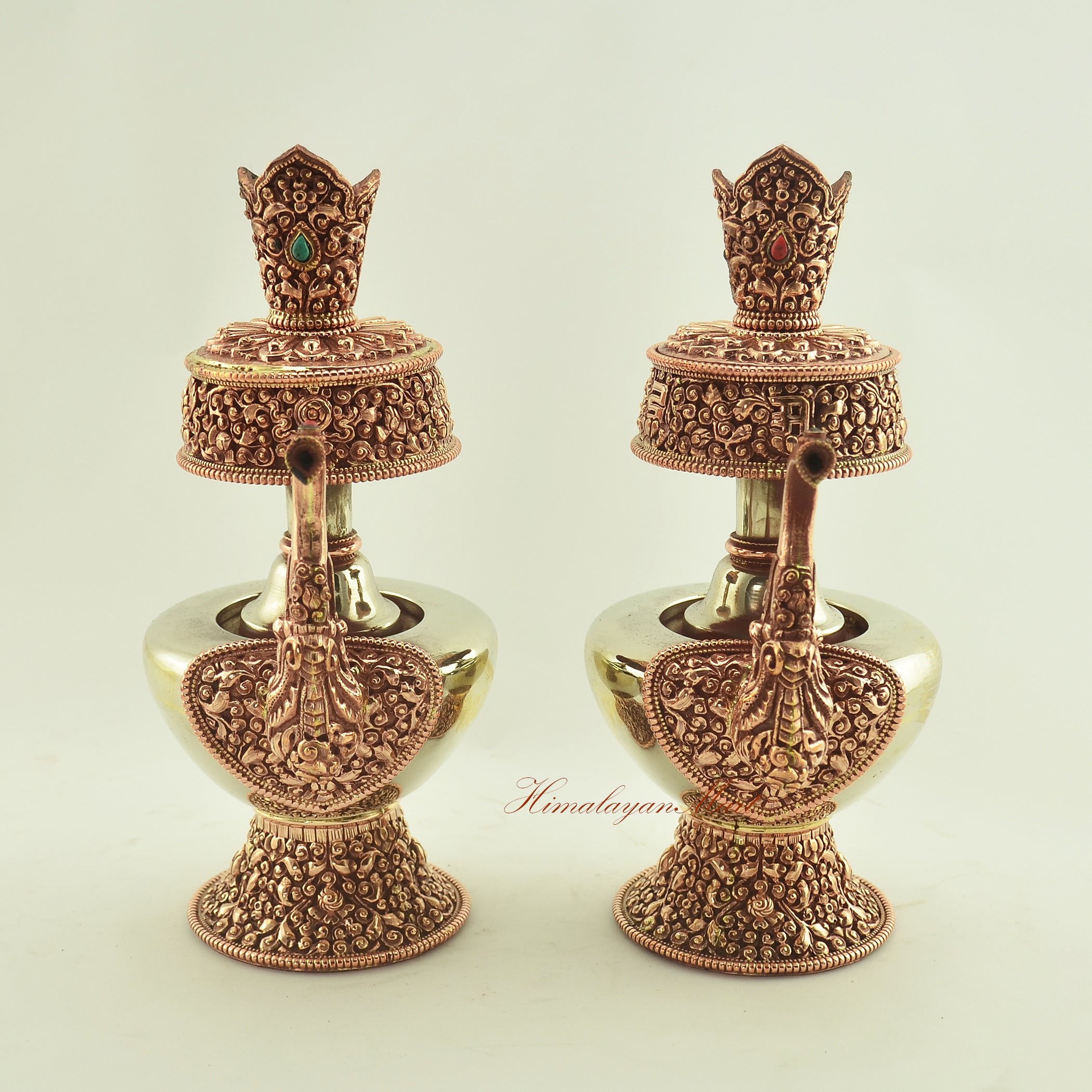 Front view of the Tibetan Ritual Bhumba Set, handcrafted with copper, white metal, and semi-precious coral and turquoise stones.