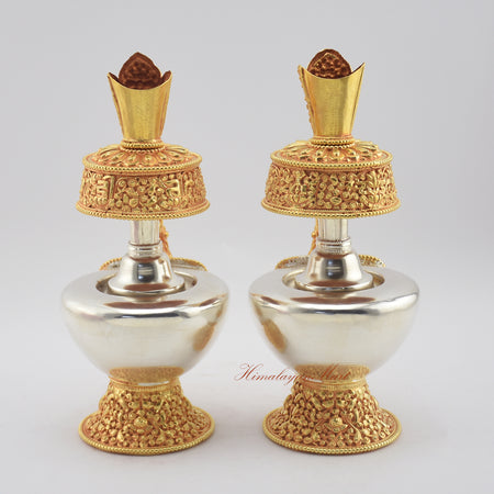 Back view of Tibetan Ritual Bumpa Vase showing intricate hand-carved Buddhist symbols