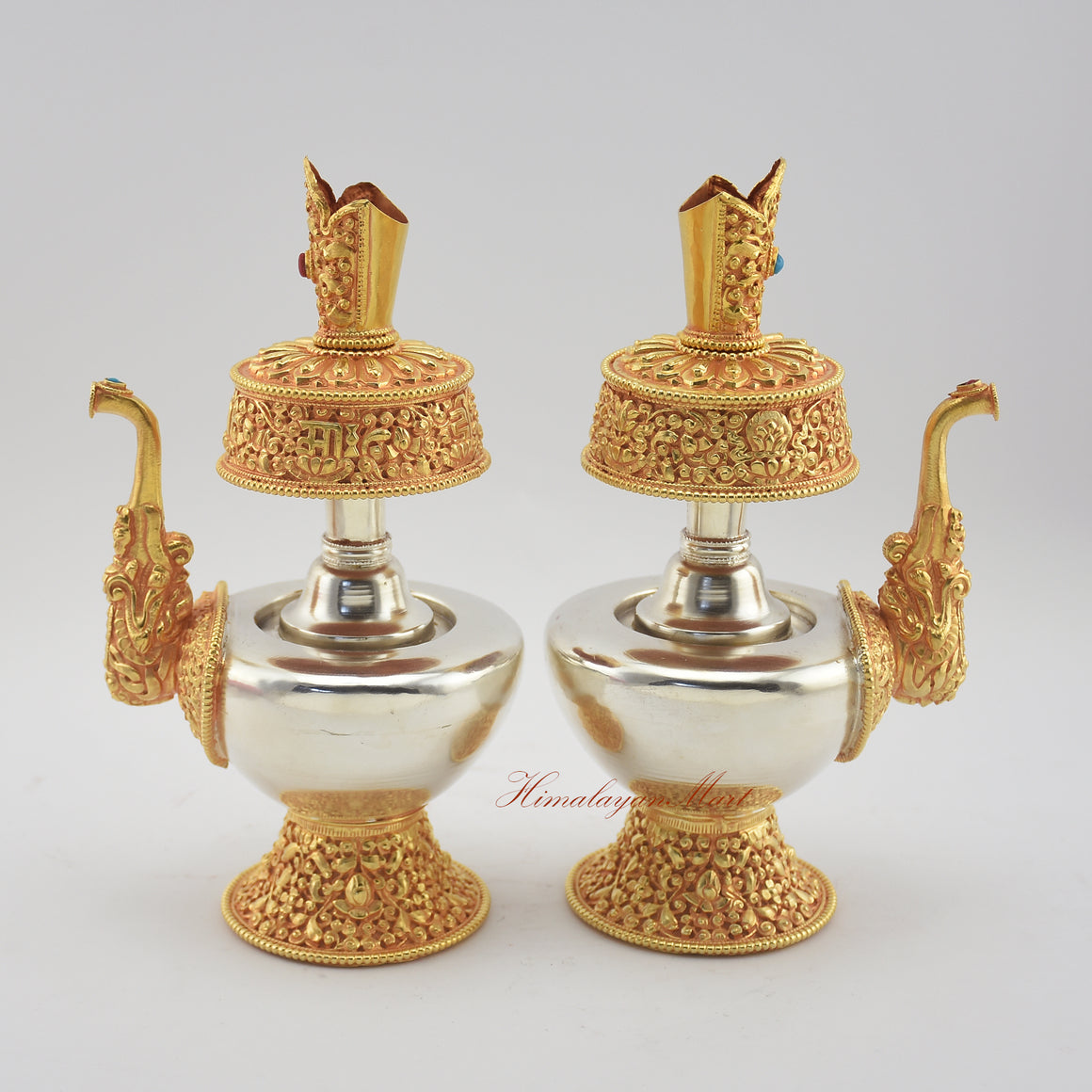 Angled view of Tibetan Ritual Bumpa Vase showing left and right sides with hand-applied decorations